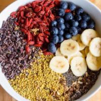 The Power Bowl · 3 scoops of Açai topped with Ki’s Granola, Blueberries, Bananas, Goji Berries, Cacao nibs, C...