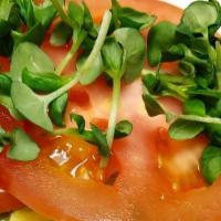 Avocado Toast · Toasted Rye Bread topped with fresh Avocado, Tomato, salt and pepper and Micro-greens.