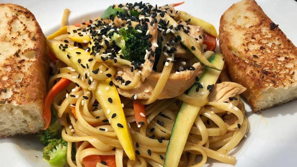 Thai Linguini · Linguini and sauteed veggies tossed in our famous peanut sauce. Your choice of Chicken, Tempeh or Tofu. Topped with sesame seeds.