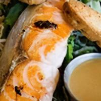 Asian Salmon Salad · Grilled Salmon on a bed of Organic Field Greens tossed in Ginger Miso Dressing with Toasted ...