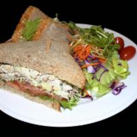 Basil Chicken Salad Sandwich · Grilled Chicken mixed with Celery, Pine nuts, chopped Basil, Green Apples and Mayo served wi...