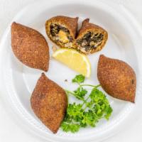 Kibbeh Vegetarian · Hand Made and Delicious - Bulgar, select vegetables stuffed with garbanzo beans, green leaf,...