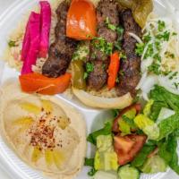 Kafta Kebab · Angus Chuck ground beef, mixed with parsley, onion & Mediterranean spices, fire-grilled, com...