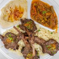 Lamb Chops · 4 pieces of free-range, grass-fed lamb chops ( house marinade ) served with hummus, green be...