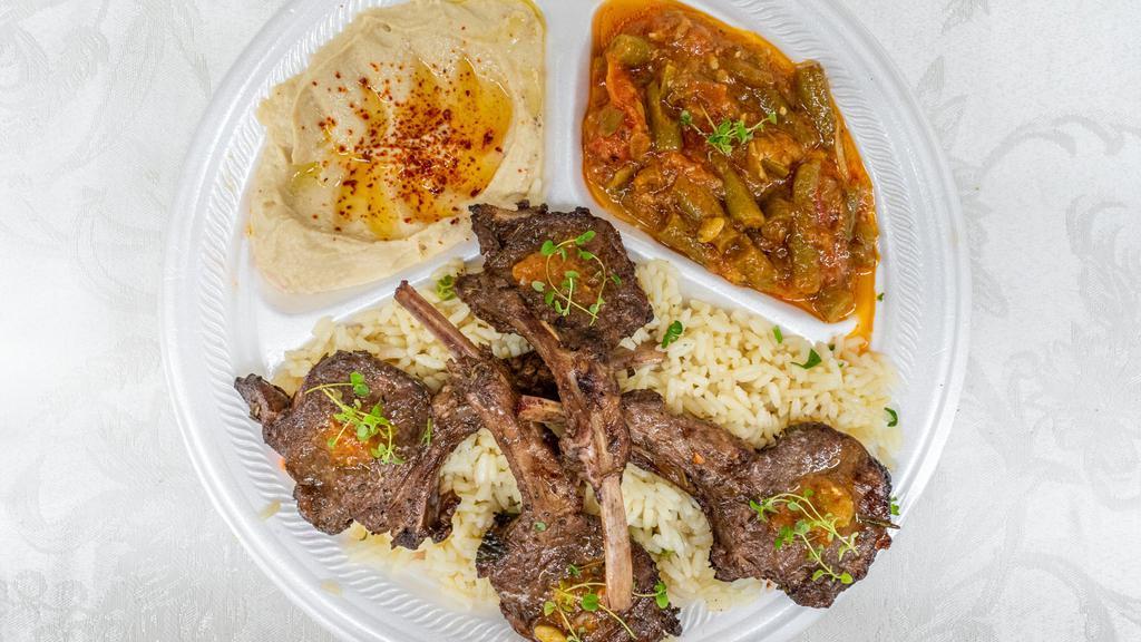 Lamb Chops · 4 pieces of free-range, grass-fed lamb chops ( house marinade ) served with hummus, green beans, and rice.