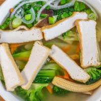 Vegetarian Noodle Soup · Tofu, broccoli, bok choy, carrot, corn, and mushroom in a vegetable broth.