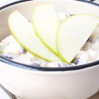 Apple & Banana Overnight Oats · rolled oats, low-fat vanilla yogurt, green apple, banana and dried cranberries served with r...