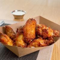 Roasted Bone-In Wings (100Pc) · One hundred roasted bone-in wings with your choice of flavor and dipping sauce.