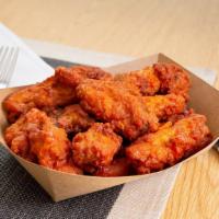 Roasted Bone-In Wings (30Pc) · Thirty roasted bone-in wings with your choice of flavor and dipping sauce.