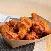 Roasted Bone-In Wings (50Pc) · Fifty roasted bone-in wings with your choice of flavor and dipping sauce.