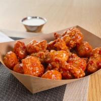 Roasted Bone-In Wings (75Pc) · Seventy five roasted bone-in wings with your choice of flavor and dipping sauce.