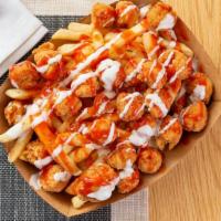 Buffalo Fries · French Fries topped with crispy chicken, buffalo sauce and ranch drizzle