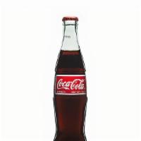 Mexican Coke · Made with real Cane Sugar