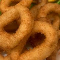 Fried Calamari · Squid rings deep fried and served with sweet & sour sauce.