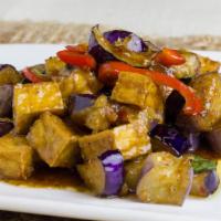 Spicy Eggplant · Eggplant sautéed with onion, bell pepper, and basil in a spicy sauce.