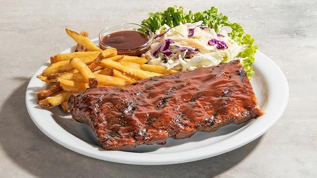 Bbq Ribs (Half Rack) · Half rack St. Louis cut spareribs with our signature Memphis. dry spice rub, slow-cooked and basted with BBQ sauce.. Served with creamy coleslaw and fries.