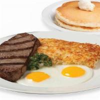 1/2 Lb. New York Steak & Eggs · Served with 2 Farm-Fresh Eggs, Golden Hash Browns or Fresh Fruit, and your choice of Toast, ...