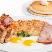 Classic Bigger Better Breakfast · 2 Bacon Strips, 2 Link Sausages, 2 Eggs, Ham and Hash Browns or Fruit. Choice of Toast or 2 ...