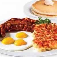 Lumberjack Breakfast · 3 Eggs, 3 strips of Bacon, 3 Link Sausages, golden Hash Browns, and 3 Buttermilk Hotcakes.