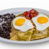 Chilaquiles Verdes · Crispy Fried Corn Tortillas cooked in Salsa Verde,. topped with 2 Eggs, Queso Anejo and Pico...