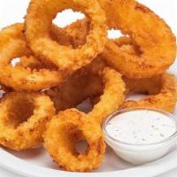 Basket Of Onion Rings · Breaded, fried & served with Ranch Dressing.
