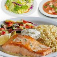 Salmon Fillet · Topped with Garlic Sauce or sprinkled with our Cajun Spice blend.  Served with Tartar Sauce ...
