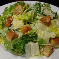 Caesar Salad · romaine hearts, home made croutons, parmesan cheese, caesar dressing.