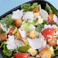 Caesar · Romaine lettuce, roma tomato, croutons, and parmesan cheese with Caesar dressing.