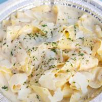 Pappardelle Alfredo · Pappardelle with a roasted garlic cream sauce.