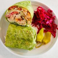 Chicken Avocado Wrap · Lettuce, tomato, pickled cabbage, Cheddar cheese, avocado, Parmesan sauce. Served with peppe...