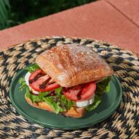 Caprese Sandwich · Fresh Mozzarella, Tomatoes, Mixed Greens, Basil, Balsamic.