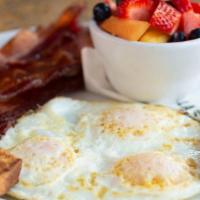 The Marmalade Breakfast · 3 Eggs any style with choice of ham, sausage, or hardwood bacon. Served with Marmalade potat...