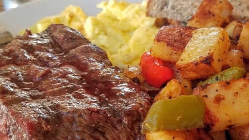 New York Steak & Eggs · 3 Eggs any style & a juicy center cut New York steak cooked to order, served with Marmalade potatoes or fresh fruit & a choice of toast.