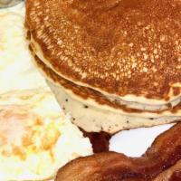 Cross Creek Breakfast · 2 Buttermilk pancakes, hardwood smoked bacon & 2 eggs any style.