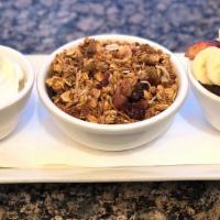 House-Made Granola · Freshly toasted and crunchy, with Greek yogurt and fresh fruit.