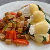 Florentine Benedict · Three poached eggs, spinach, and sliced tomatoes smothered in hollandaise. Choice of Marmala...