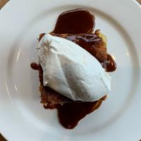 Caramelized Pear Bread Pudding · Whiskey caramel sauce, whipped cream.