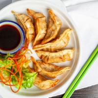 Bangkok Gyo · Fried or steamed dumpling stuffed with chicken and vegetable, served with ginger sauce.