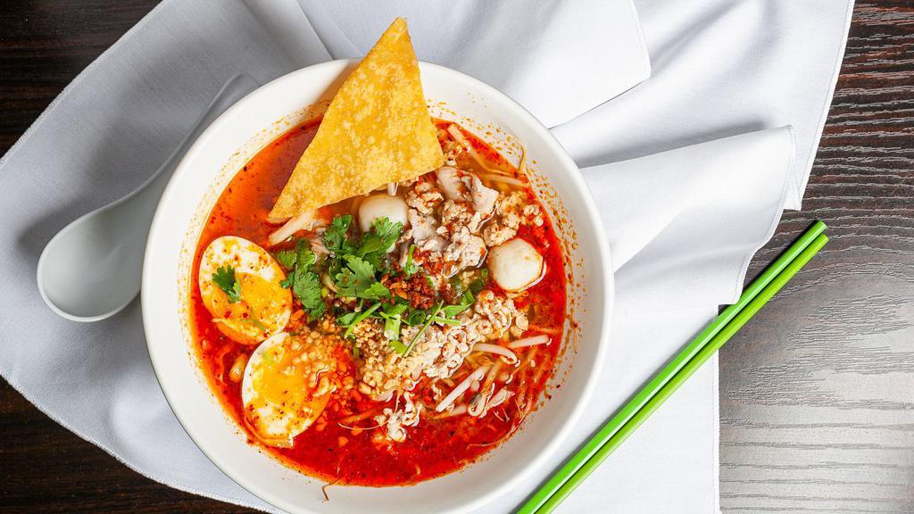 Tom Yum Noodles Soup · Spicy. Thai spicy and sour soup with fish ball, minced pork, pork slices, soft boiled egg, fried wonton, beansprouts and crushed peanut.