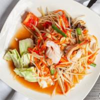 Som Tum Thai · Popular choice and spicy. Savory, sweet Papaya salad with tomato, carrot green beans, shrimp...