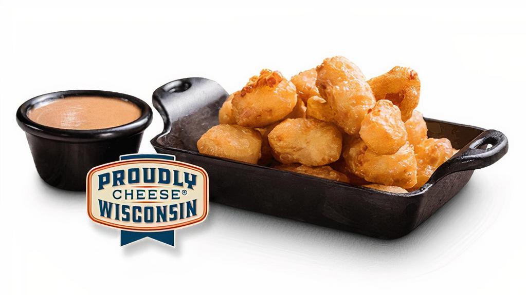 Cheese Curds Appetizer · Served with Dave’s Ranch & Sassy Sauce.