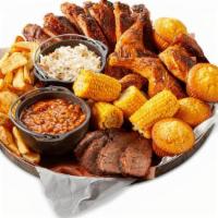 All-American Bbq Feast® · A full slab of St. Louis-Style Spareribs, a whole Country-Roasted Chicken, choice of Texas B...