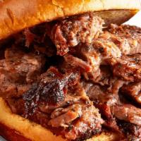 Texas Beef Brisket Sandwich · Piled high with hand-seasoned, hickory-smoked Texas Beef Brisket. . Served with choice of 1 ...