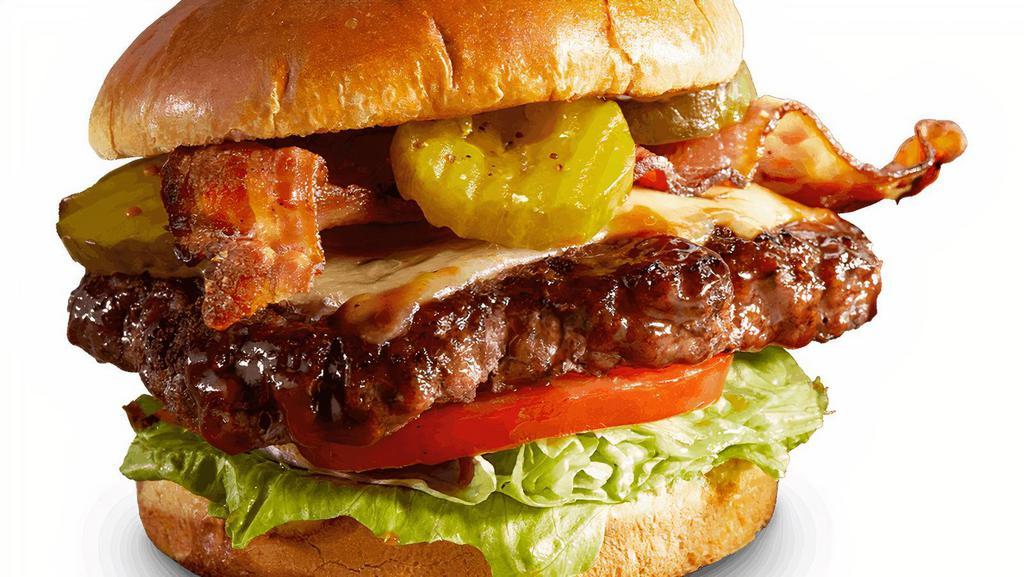 Dave'S Favorite Burger* · Slathered with Rich & Sassy® then topped with melted Monterey Jack cheese, two strips of bacon, lettuce and tomato. Served with choice of one side and spicy Hell-Fire Pickles.