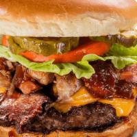 Ultimate Burger* · Piled high with Georgia Chopped Pork and two strips of bacon, melted sharp American cheese, ...