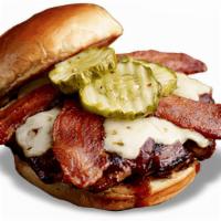 Devil'S Spit® Burger* · Slathered with Devil's Spit® BBQ sauce and topped with melted pepper-Jack cheese, bacon and ...