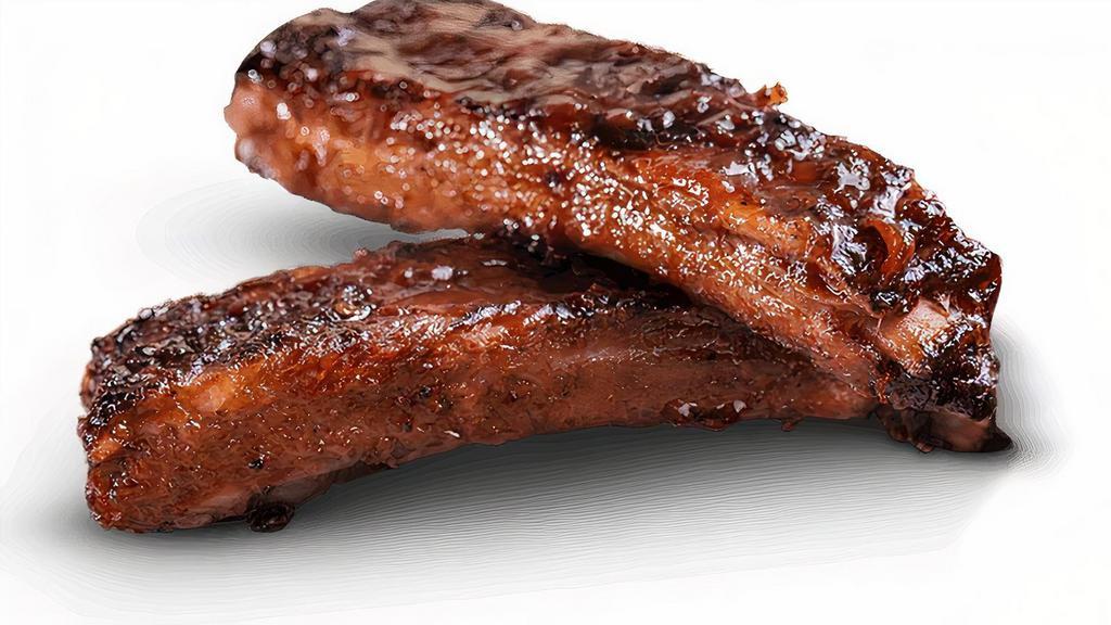 Kid'S Rib Dinner · Hand-rubbed with Dave's secret blend of special spices and pit-smoked over a hickory fire. Then slathered with Rich & Sassy® over an open flame to seal in the Famous Flavor. Served with choice of one side, plus OREO® Cookies and a fountain beverage or milk.