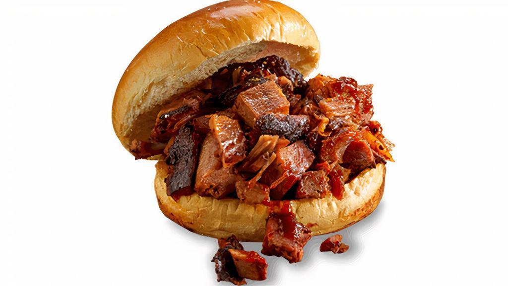 Kids' Georgia Chopped Pork Sandwich · Award-winning, slow-smoked chopped pork topped with Rich & Sassy®. Served with choice of one side.