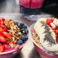 Acai Bowl · We have four different flavors. Comes with fruit on top  honey , granola , chia seeds and al...