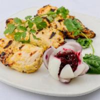 Murgh Malai Tikka · Chicken breast marinated with herbs & spices.